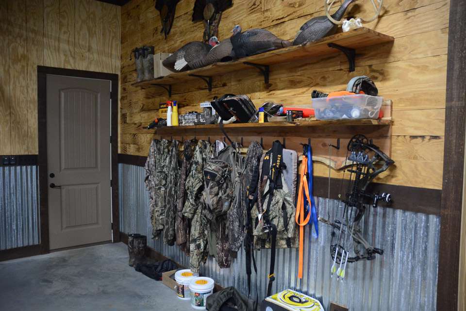 Opposite the wall of lures is this space devoted to wild turkey and whitetail deer hunting, Areyâs offseason passions.