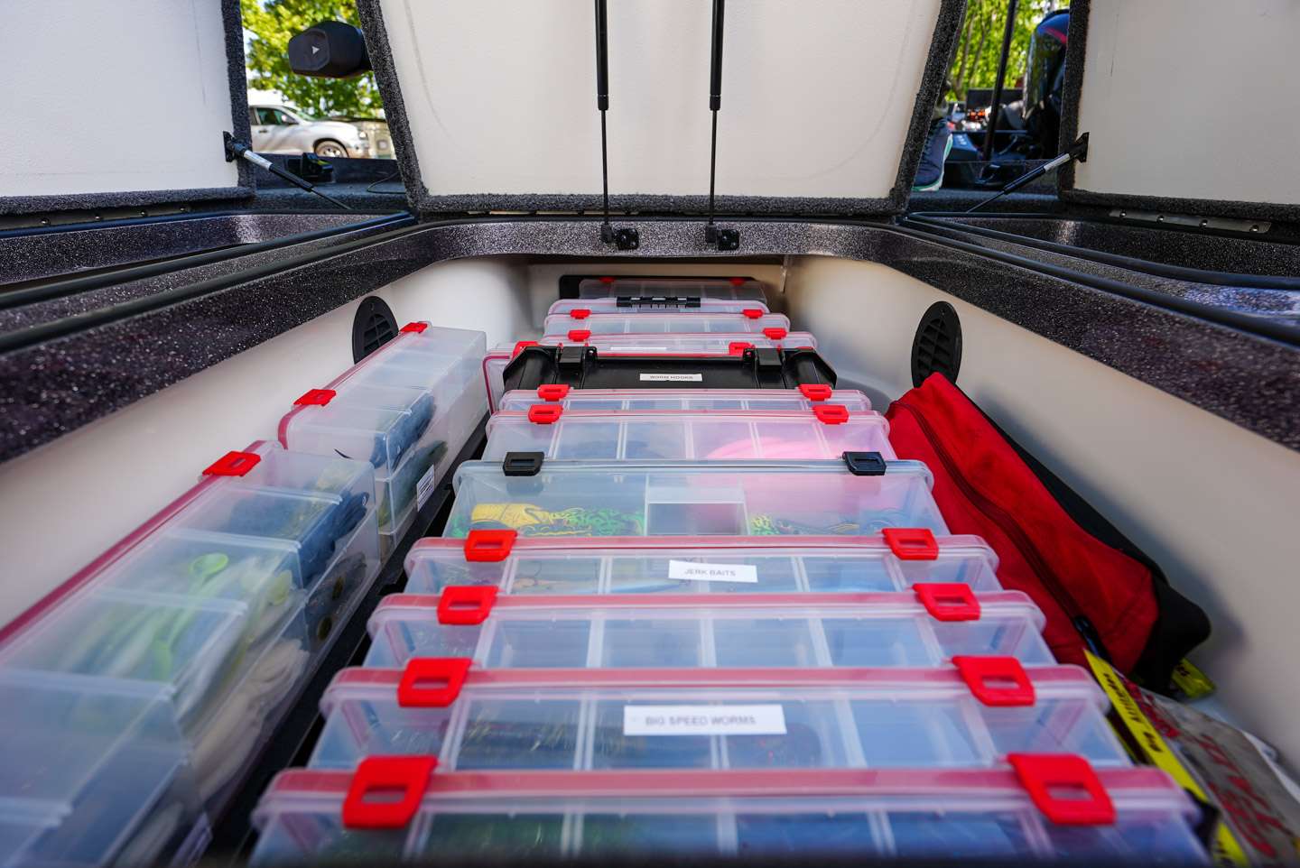 The center compartment is home to a plethora of Bass Mafia tackleboxes.  