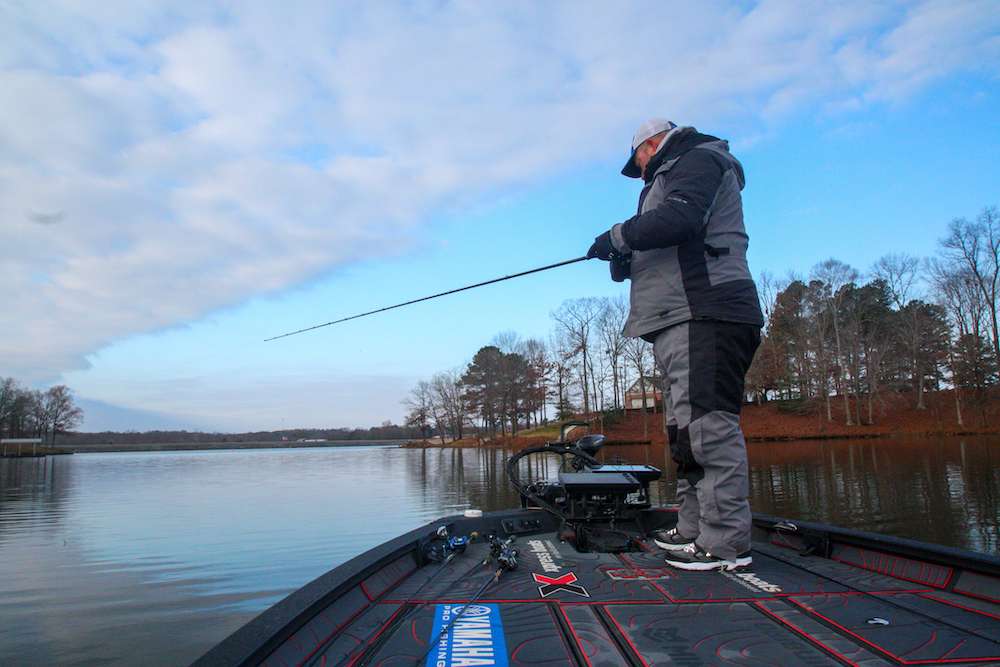<b>8:09 a.m.</b> He switches to a perch-colored Megabass 110 Plus suspending jerkbait and targets docks. <br><br> <b>SIX HOURS LEFT</b><br> <b>8:15 a.m.</b> Back to the RkCrawler. âThis looks like an awesome spawning cove, but itâs deep enough to attract winter bass as well.â <br> <b>8:17 a.m.</b> A bass taps the crankbait but doesnât hook up. âThereâs a big tree on the bottom where I just threw. That felt like a good fish.â <br> <b>8:18 a.m.</b> Horne hits the tree with a 3/4-ounce brown/purple (âpbjâ) Greenfish Tackle Crawball football jig with a green pumpkin Big Bite Baits Twin Tail trailer, but apparently the bass has left the building. <br> <b>8:22 a.m.</b> Horne ties on a Tennessee shad color Spro Little John crankbait and continues around the cove. <br> <b>8:30 a.m.</b> Horne hits a deep brushpile in front of a boathouse with the jig, jerkbait and RkCrawler without success. <br> <b>8:41 a.m.</b> Horne tries the jerkbait around a mud point at the entrance to the cove. No takers here, either. âFifty-degree water is perfect for jerkbaits! I do best on them on sunny days, however, and itâs clouding up now. But like Annie sings in that musical, âThe sun will come out â¦ tomorrow!ââ <br> <b>8:53 a.m.</b> Horne exits the cove and blasts uplake to a steep channel bank with a deep seawall and several docks. He cranks the wall with the RkCrawler. <br> <b>8:54 a.m.</b> Horneâs crankbait catches an 11-inch bass off the wall. <br> <b>8:57 a.m.</b> A tiny bass attempts to eat (or maybe mate with?) the RkCrawler. âTheyâre getting smaller instead of bigger, but at least Iâm getting bites!â <br> <b>9:01 a.m.</b> Horne switches to the perch jerkbait on the seawall. 	<br><br> <b>FIVE HOURS LEFT</b><br> <b>9:15 a.m.</b> Horne skips the jig under a dock and bags a short fish. âBack when I was fishing the Opens, I had trouble skipping jigs under docks until I went to a rod with a softer tip. That and plenty of practice really helped.â 