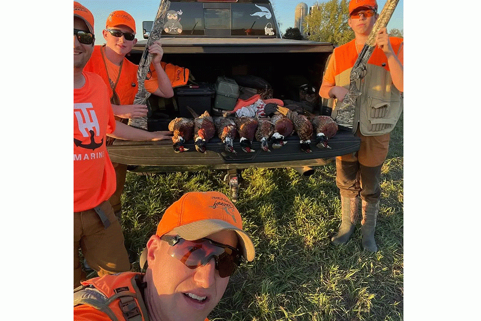 Up in Minnesota, Austin Felix (left) and his crew got it done on opening day of the pheasant season. âIt took all day but we managed to get our four-man limit. All public birds.â