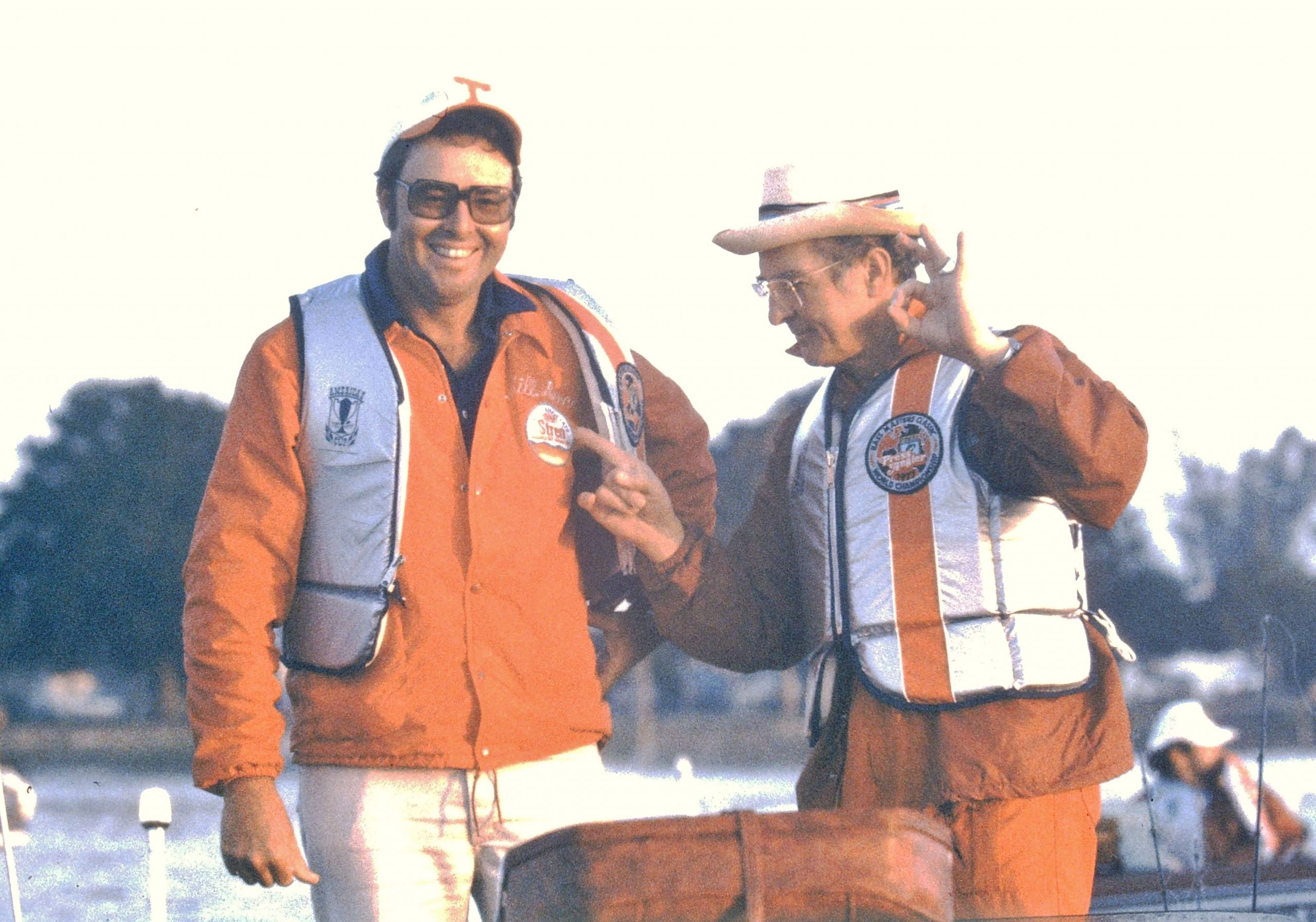 <b>1977</b><br>With three titles, Dance had quickly become one of the most beloved anglers of all time. Here he jokes with legendary outdoor writer Homer Circle.