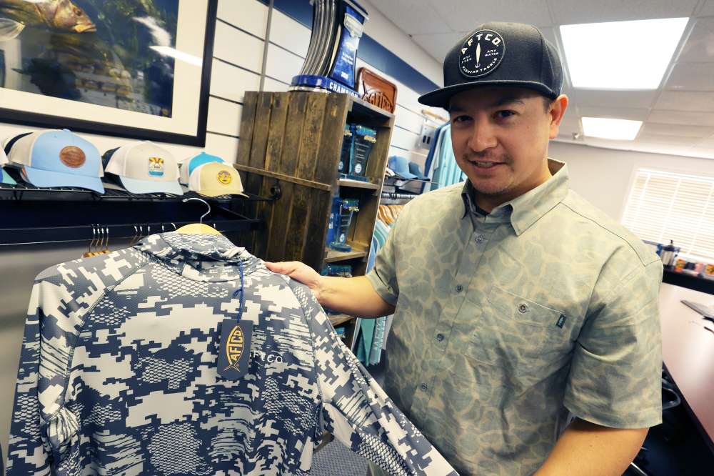 AFTCO Marketing Director Matt Florentino holds one of the ICAST 2021 Best of Show items â the AFTCO Adapt Phase Change Fishing shirt. This versatile shirt helps anglers stay warm when the temperatures are cooler, and stay cooler when the temperatures are warmer. 