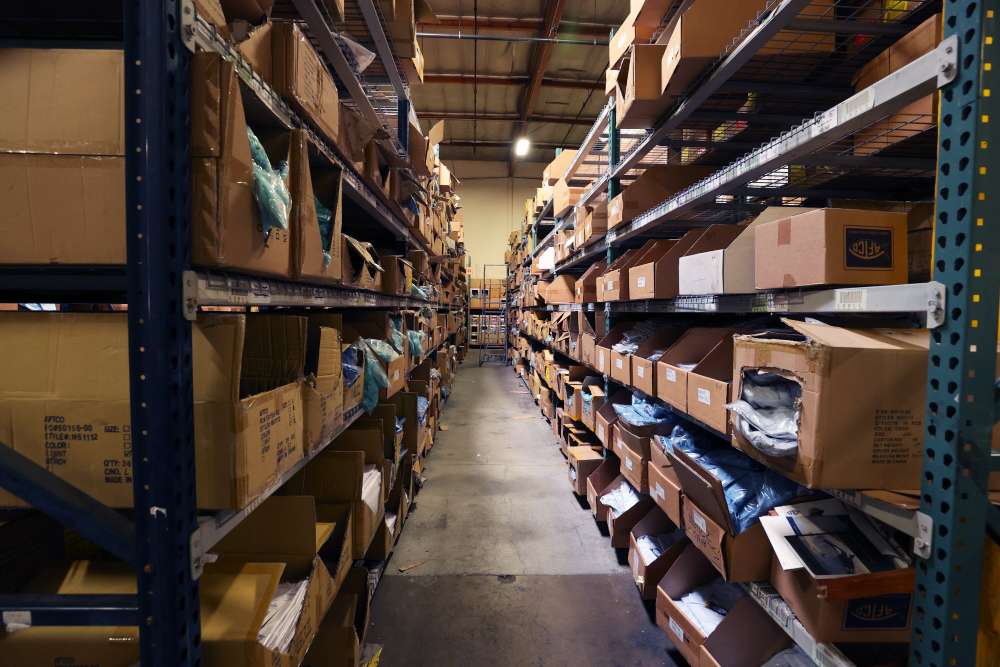 As you look down the rows, the realization of how many items AFTCO has rings out. Everything from face buffs to full rainsuits are housed in this warehouse. 