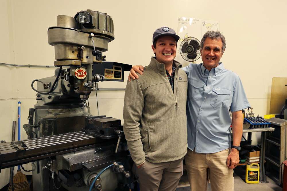 Bill and Casey Shedd in front of some of the original AFTCO machinery. 
