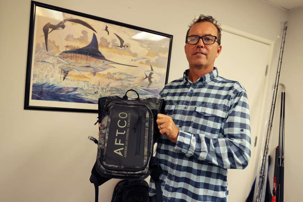 Robby Gant, the tackle product manager, shows the new AFTCO Urban Angler Bag. This bag will be perfect for bank fishing, surf fishing or anything where a compact bag is needed. 
