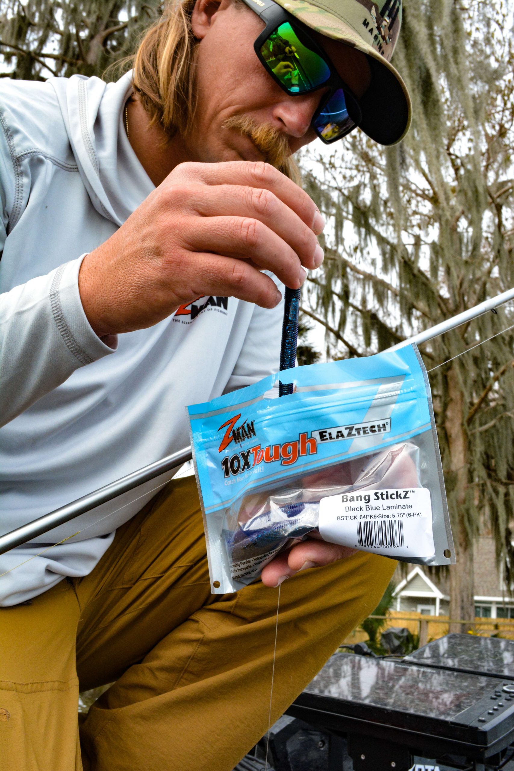 Z-Man pro Seth Feider starts the day with a dip into his bag of Bang StickZ, one of Feiderâs big fish favorites.