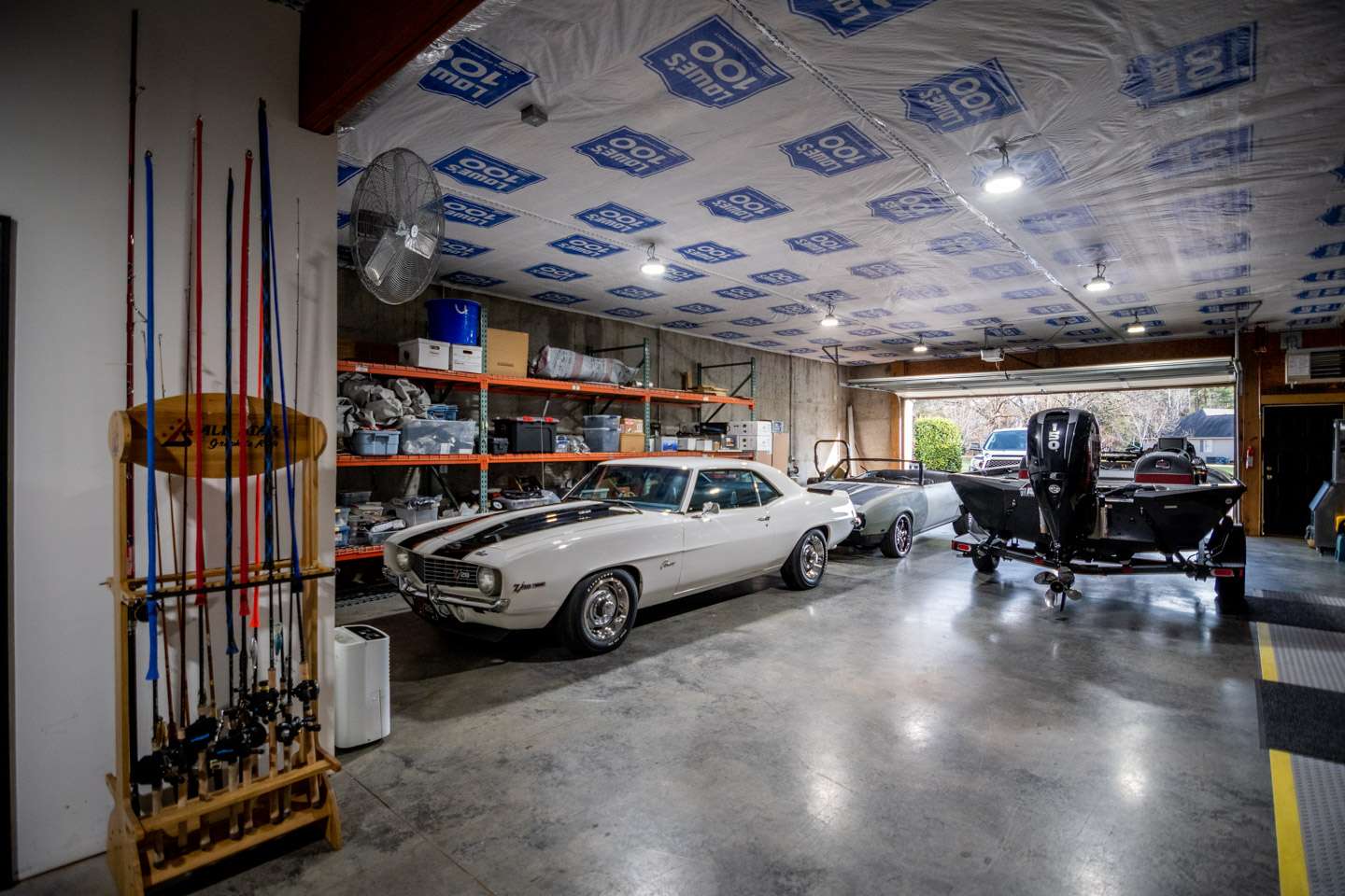 Upon the first glance, the spacious garage is home to a familiar sight. That is Auten’s RT198 rig used mostly for fun fishing. There is also more eye candy to behold. 