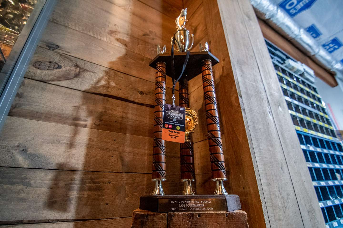 One of Auten’s earlier home lake fishing trophies have a place right next to the entrance of the room. It’s a first-place trophy from an October 2000 derby. 