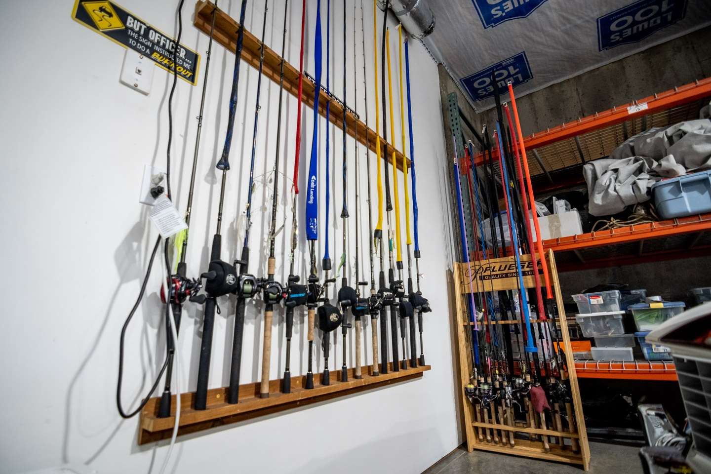 Towards the back of the shop, Auten has several racks to hold a variety of fishing rods. 