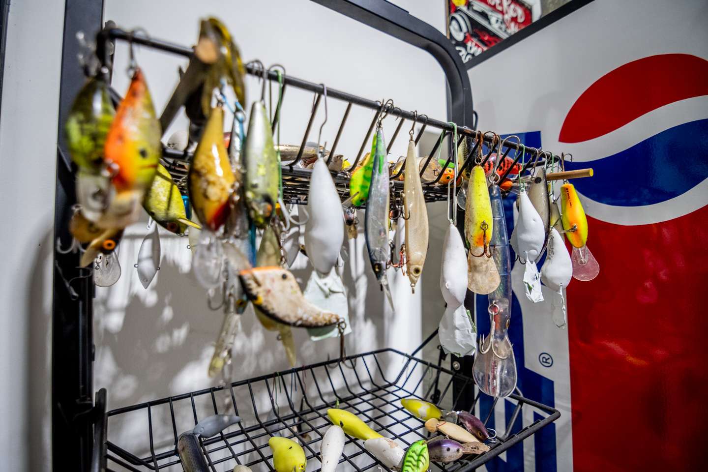 This rack is the holding place for all rescued lures that need work. As long as they aren’t broken, he will clean, repaint and add fresh hooks to one day be used again. 