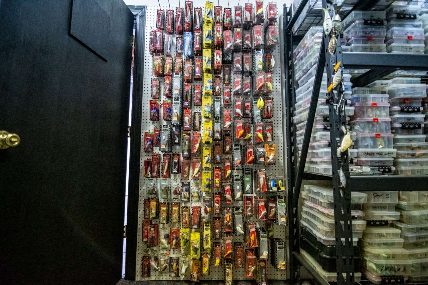 Behold the Lucky Craft wall. Behind the door of the tournament tackle room is a pegboard wall full of Lucky Craft Lures, including a variety of older and discontinued ones. 