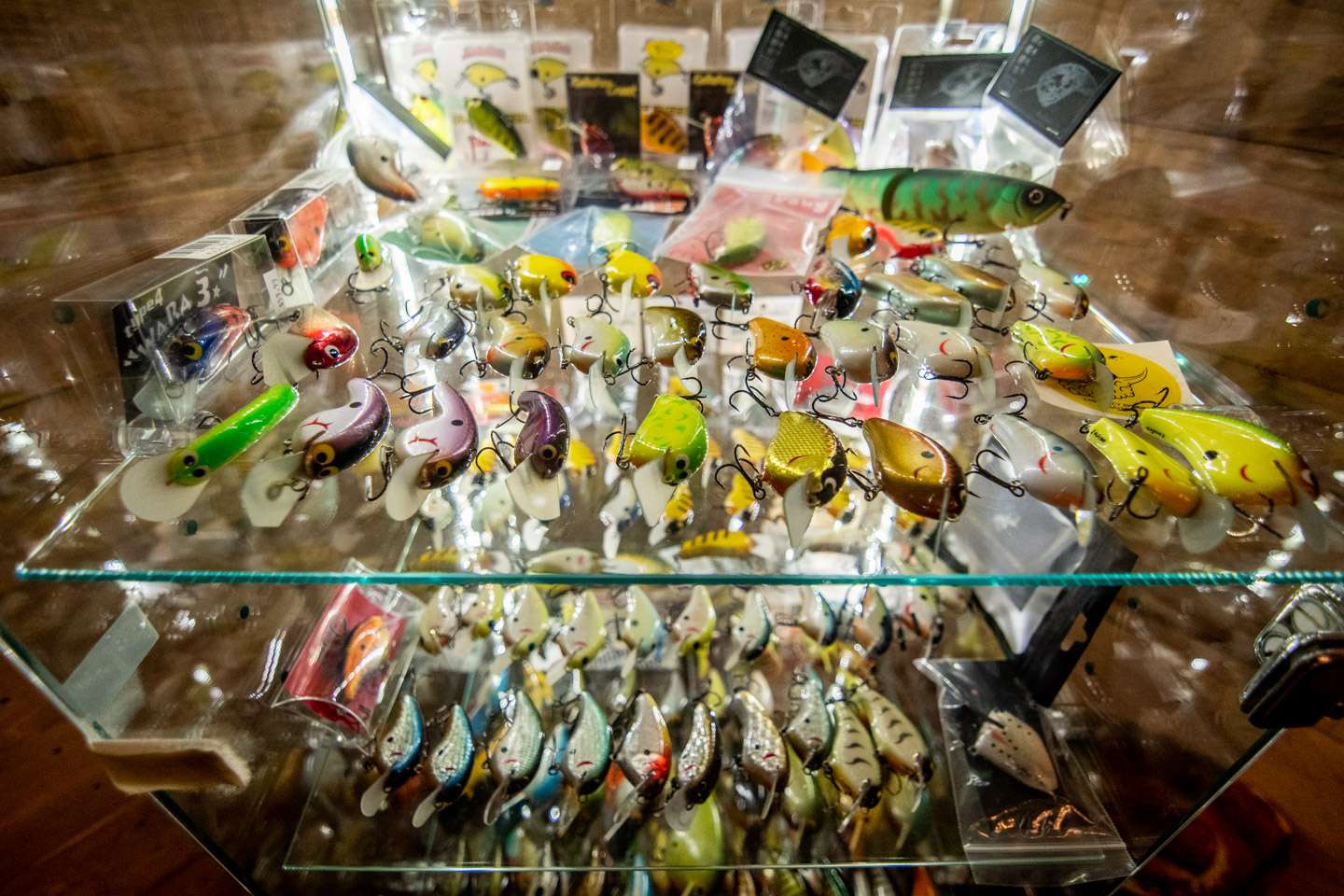 A variety of JDM baits occupy this middle shelf.