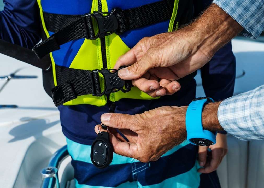 
 
<figcaption>Besides wristbands, remote fobs can be attached to life jackets and apparel.</figcaption>” class=”wp-image-566728″><figcaption>Besides wristbands, remote fobs can be attached to life jackets and apparel.</figcaption></figure>
<p>If you’re driving and are ejected from the boat, 1st Mate will immediately stop the engine. Then, using the man-overboard (MOB) feature of the mobile app, it will send an alert to other connected passengers along with a waypoint marking where the overboard event occurred. The app can then instruct a connected passenger on how to restart the engine and guide that person to where you went overboard.</p>
<div class=