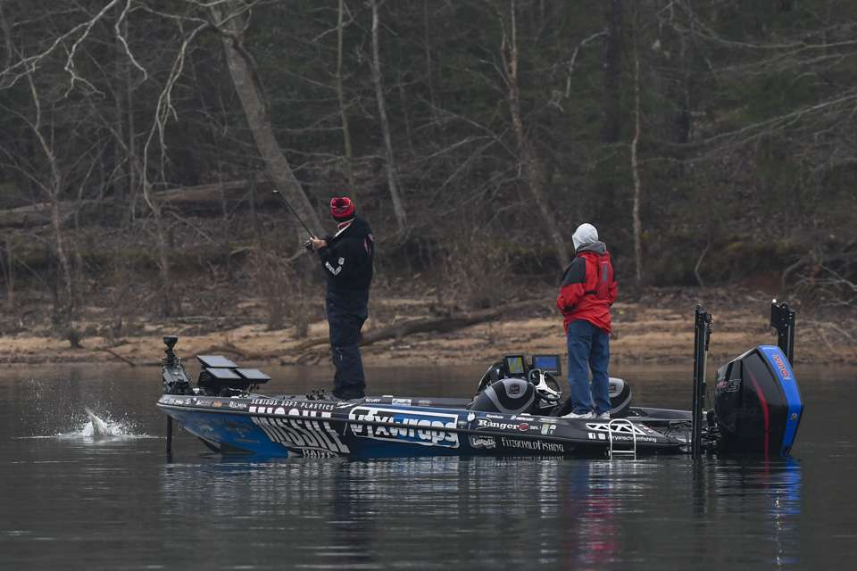Meanwhile, Elite pro Bryan Schmitt hooked a solid bass about 50 yards away in the same cove.