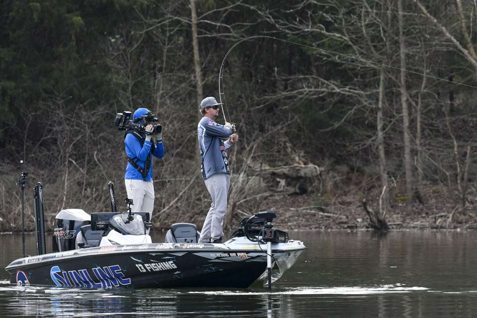 The bass couldn’t resist the lure, and Welcher was soon struggling to get the fish in his boat.
