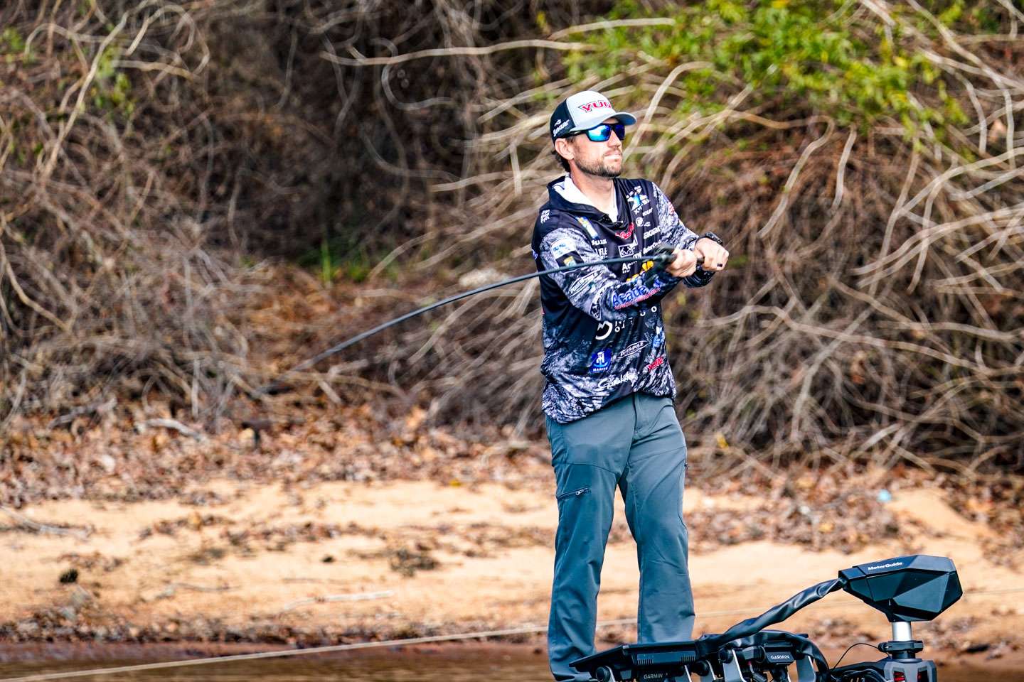 Blaylock picks back up and chunks a swimbait down the bank. 