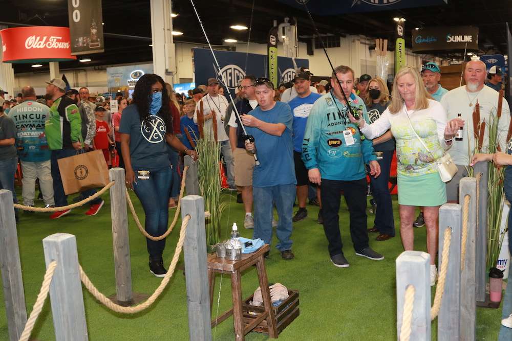 Flipping games at the Tin Cup booth.